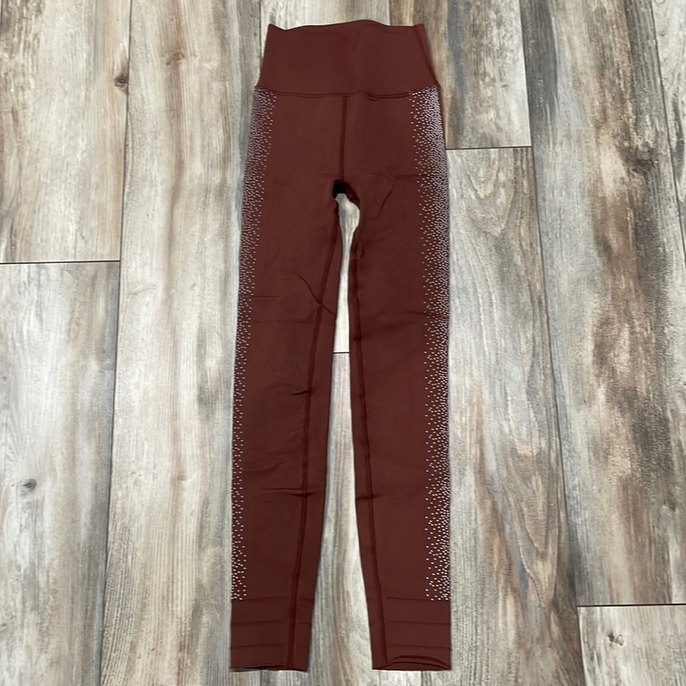 Fabletics burnt orange sculpt knit leggings. Women’s small.